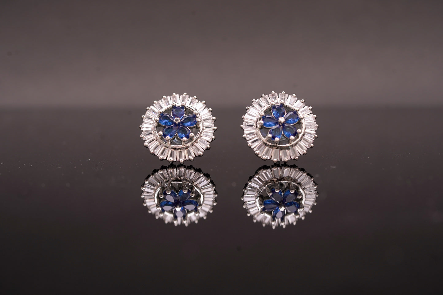 Alluring ear studs with blue sapphire stone and real American diamonds