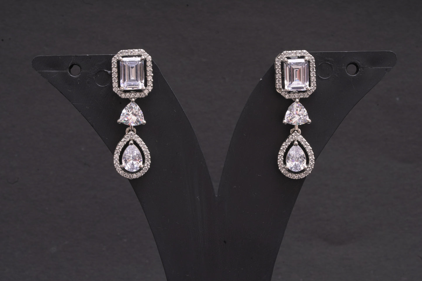 Alluring earrings with dual cut real American diamonds