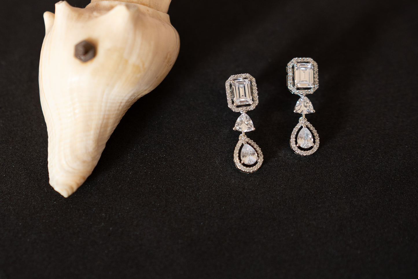 Alluring earrings with dual cut real American diamonds