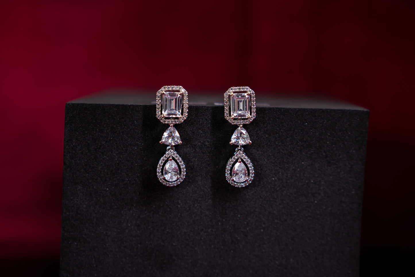 Alluring earrings with dual cut real American diamonds