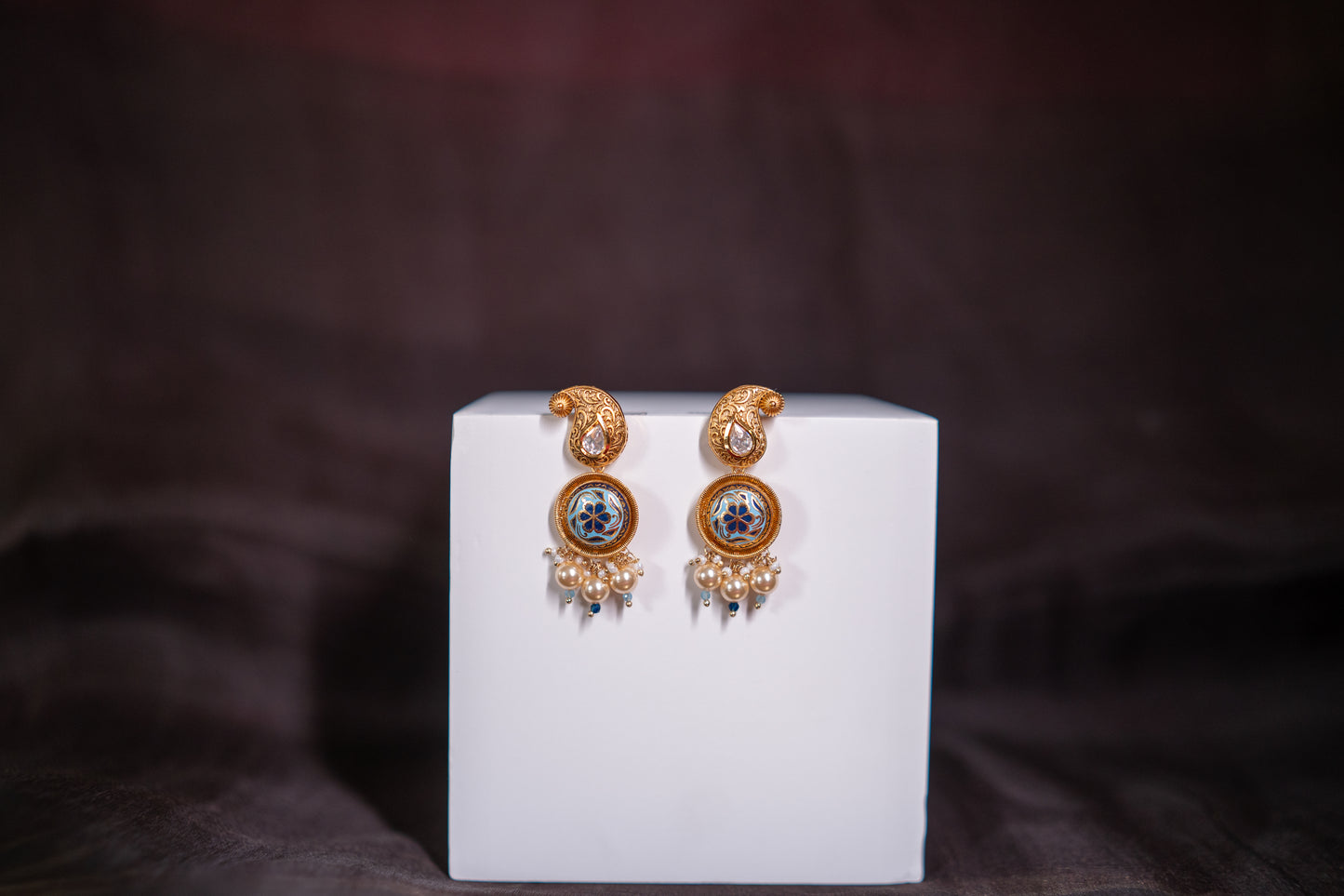 Beautiful gold finish stone polki and enamel work earrings in blue
