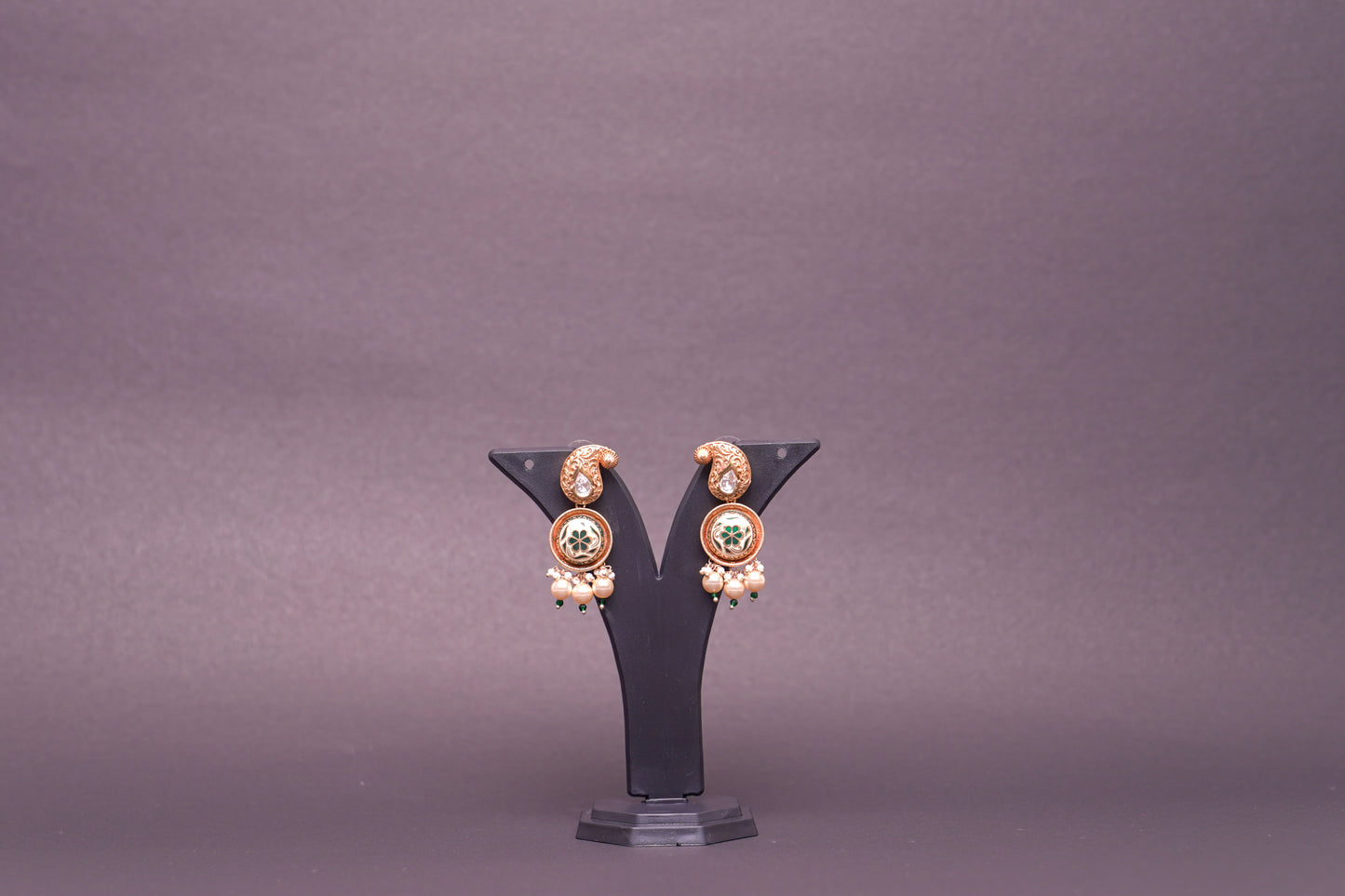 Beautiful gold finish stone polki and enamel work earrings in green