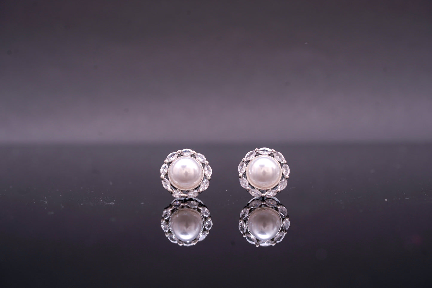Beautiful round ear studs with pearl and real American diamond