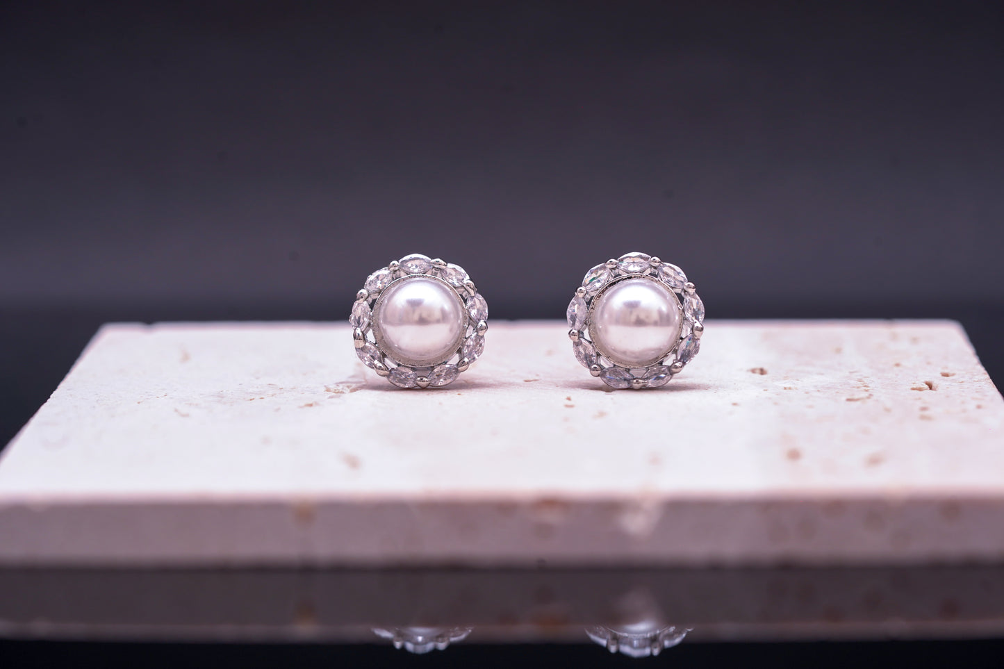 Beautiful round ear studs with pearl and real American diamond