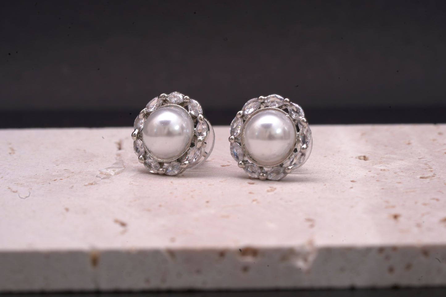 Beautiful round ear studs with pearl and real American diamond