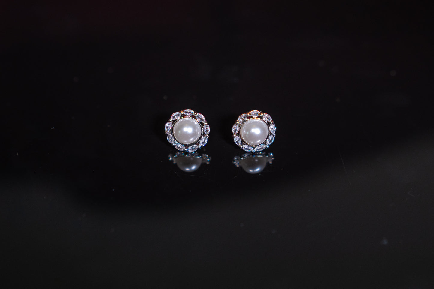Beautiful round ear studs with pearl and real American diamond