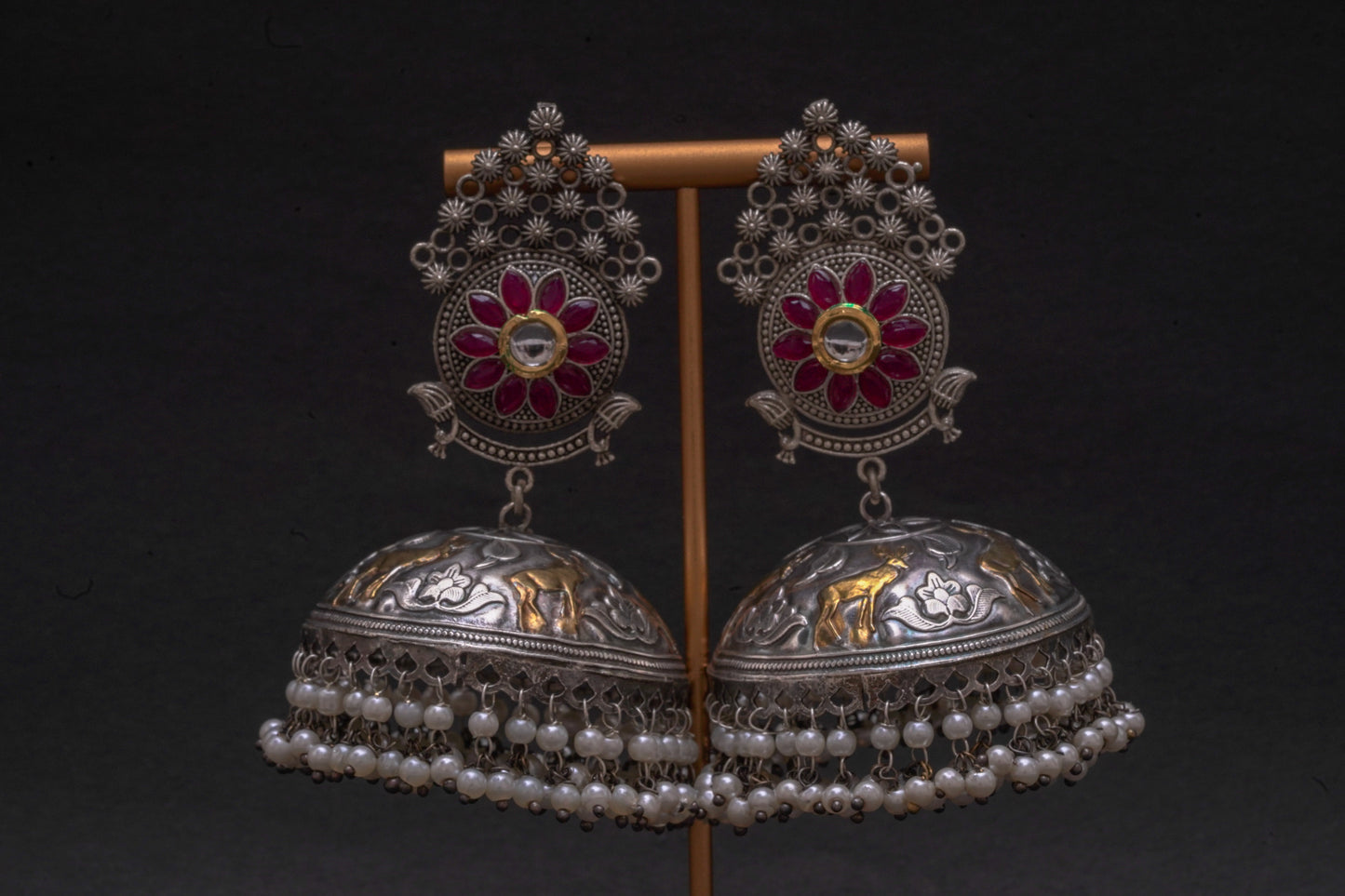 Elegant Silver & Gold-Tone Jhumkas with Red Stone Accent