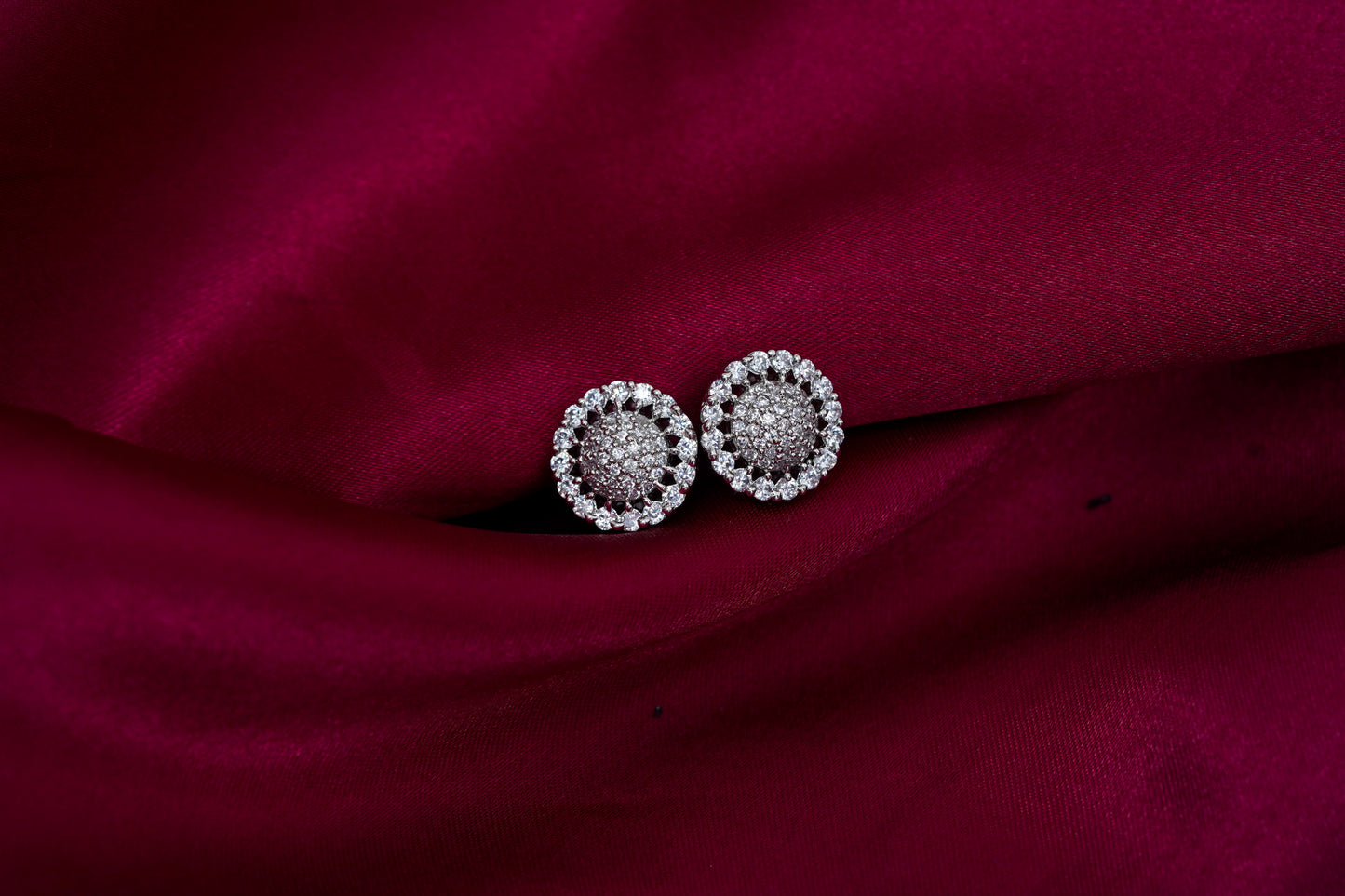 Claret ear studs in american diamonds
