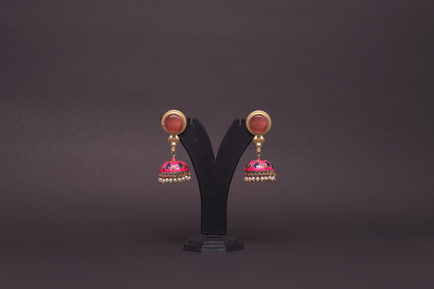 Colourful jhumkas in happy pink with an enamel finish