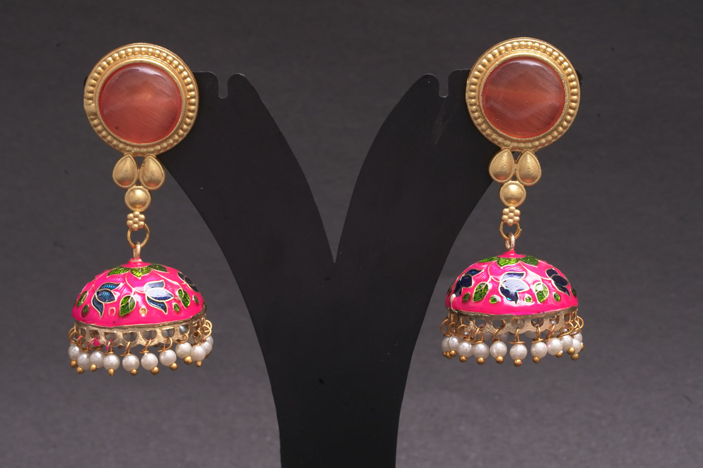 Colourful jhumkas in happy pink with an enamel finish