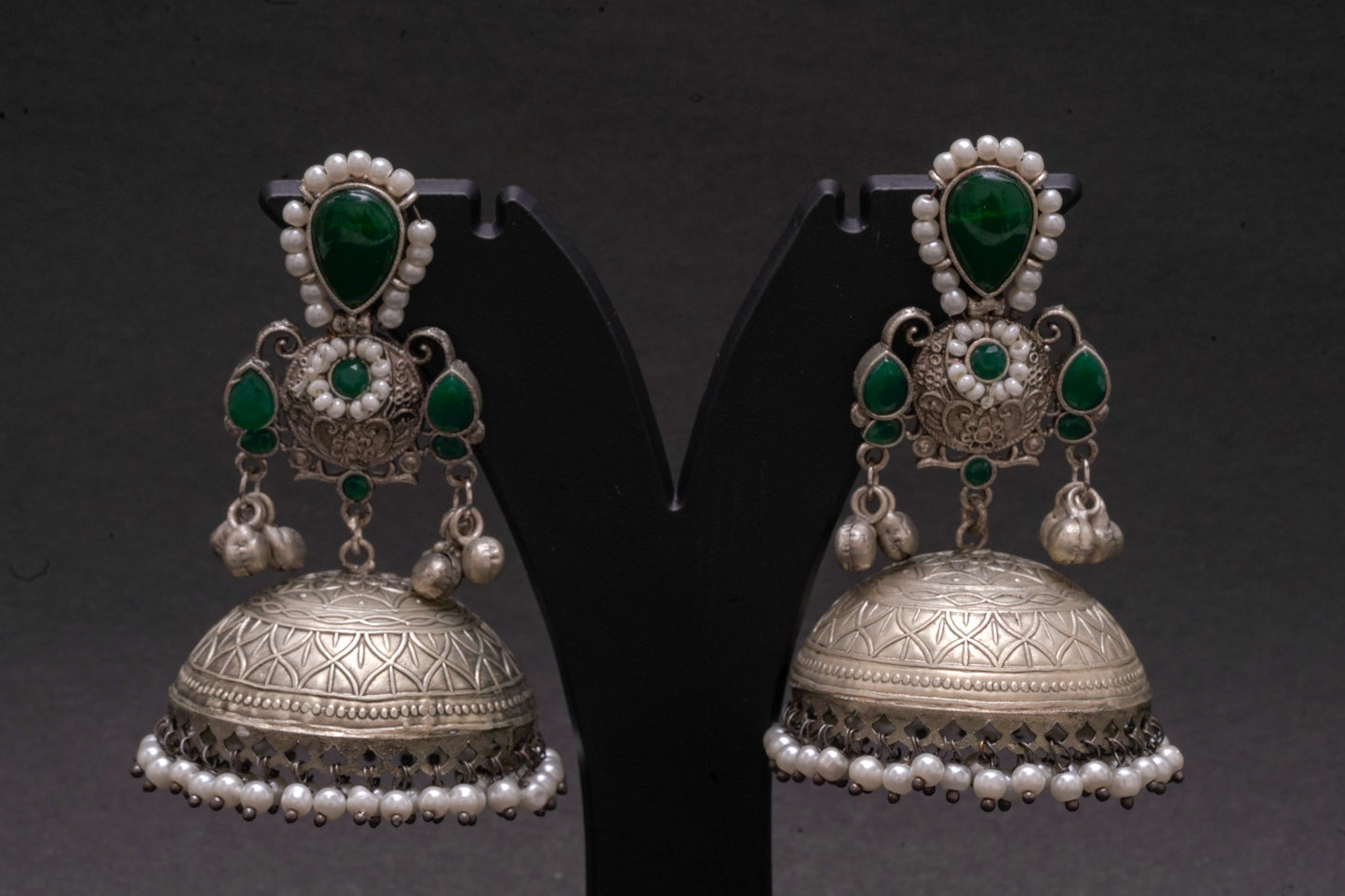 Dazzling Silver-Finish Jhumkas with Green Stones