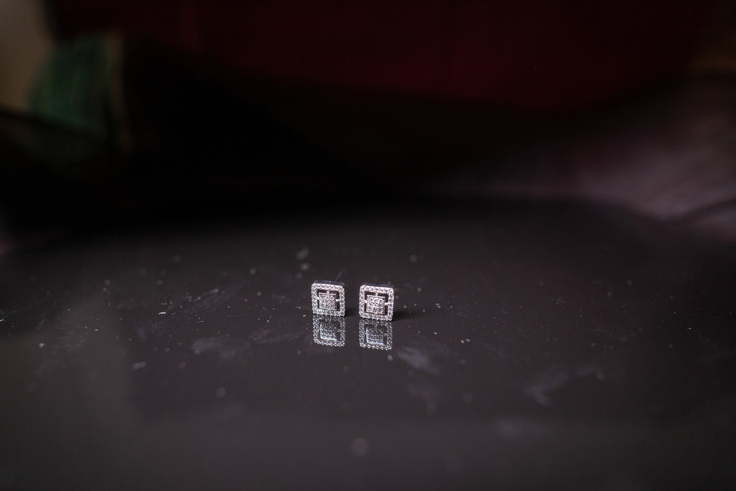 Elegant American diamond studs in a square shape in white gold finish