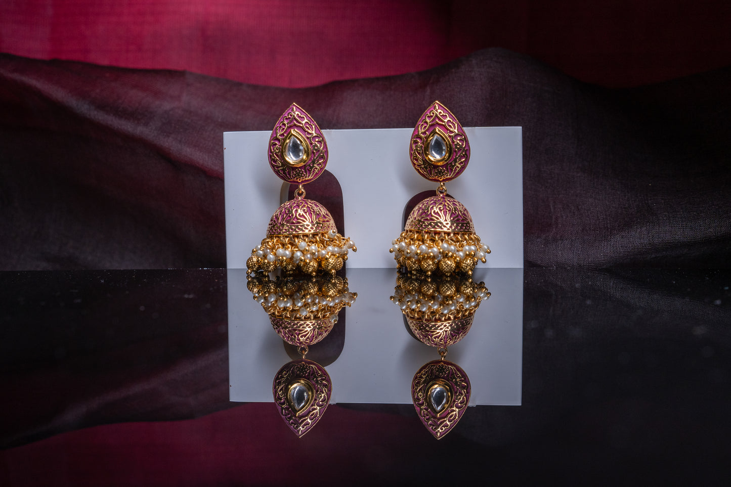 Jaipur rani pink jhumkas in gold finish