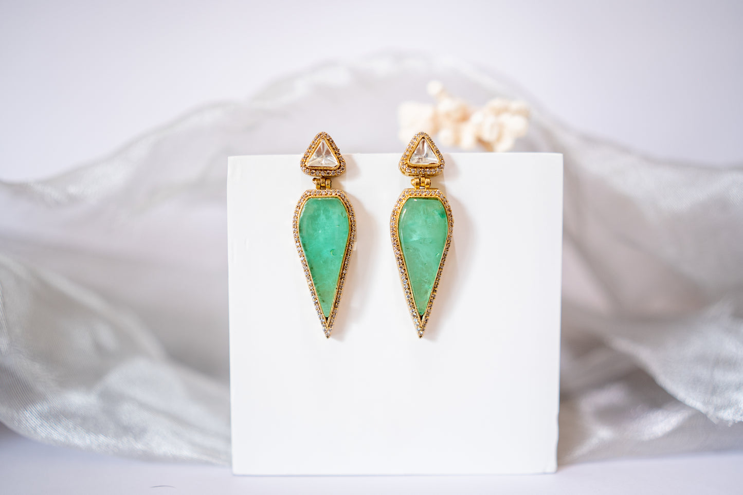 Leaf shaped danglers in verdant green with polki and American diamonds