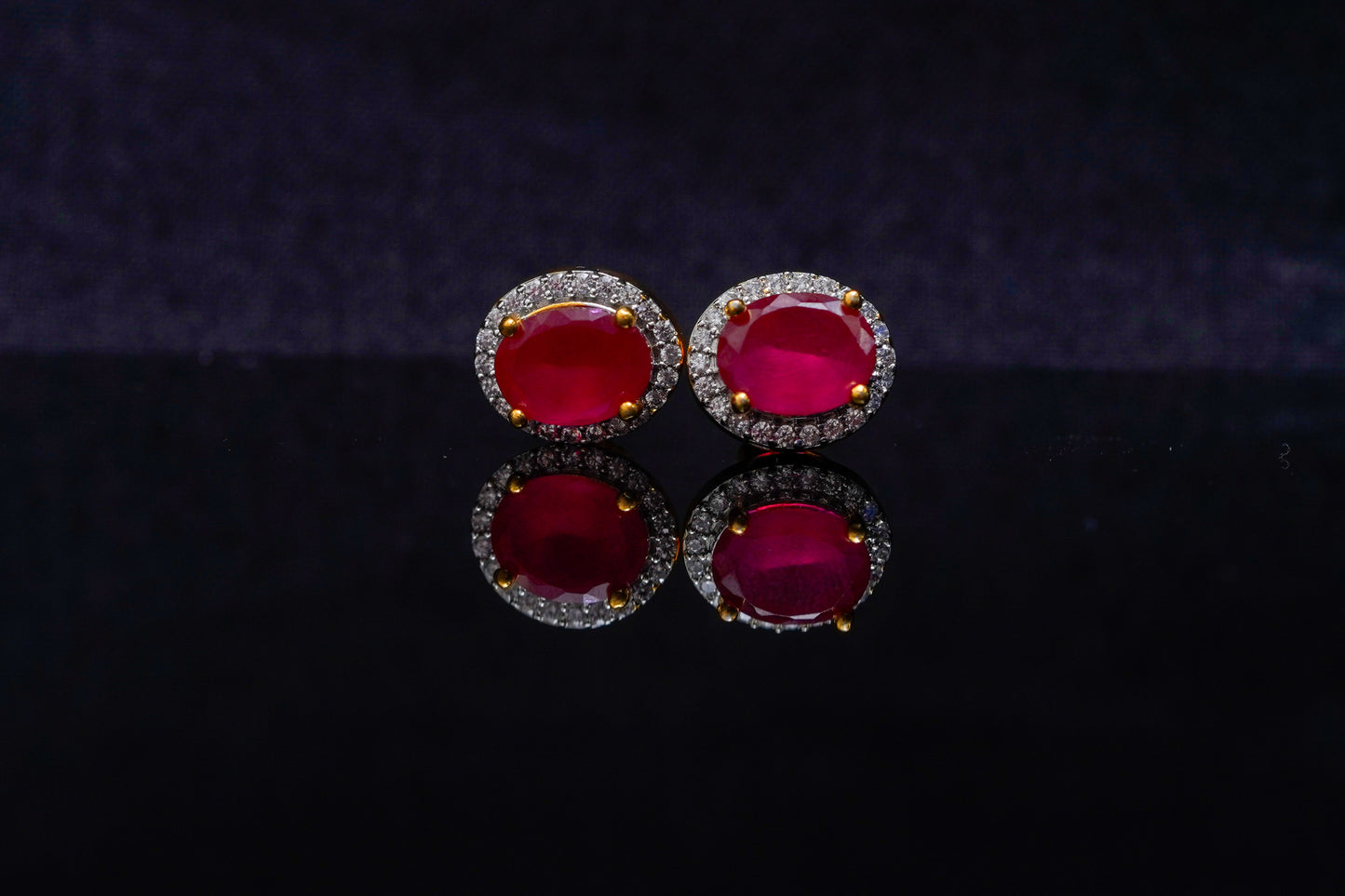 Orna ear studs in red