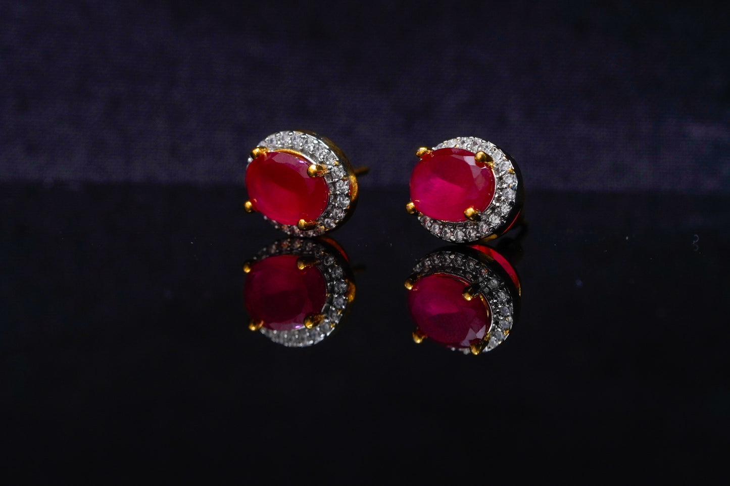 Orna ear studs in red