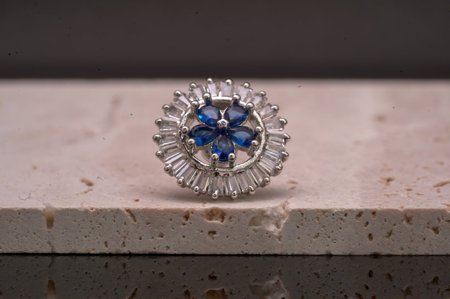Alluring ear studs with blue sapphire stone and real American diamonds