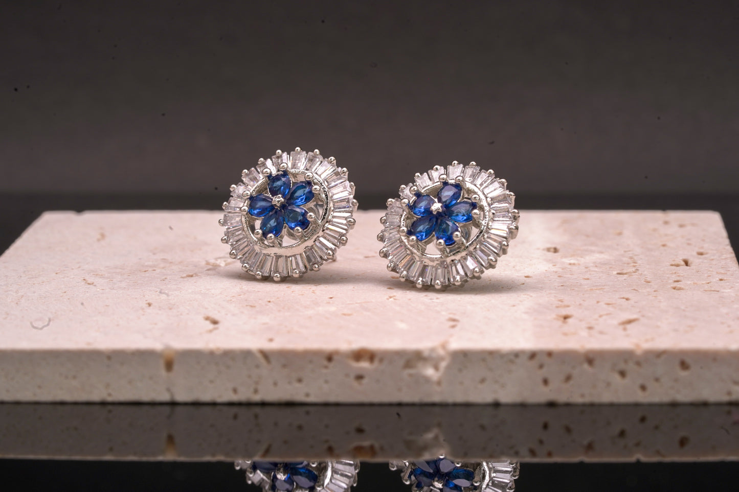 Alluring ear studs with blue sapphire stone and real American diamonds