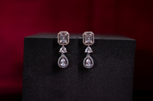 Alluring earrings with dual cut real American diamonds