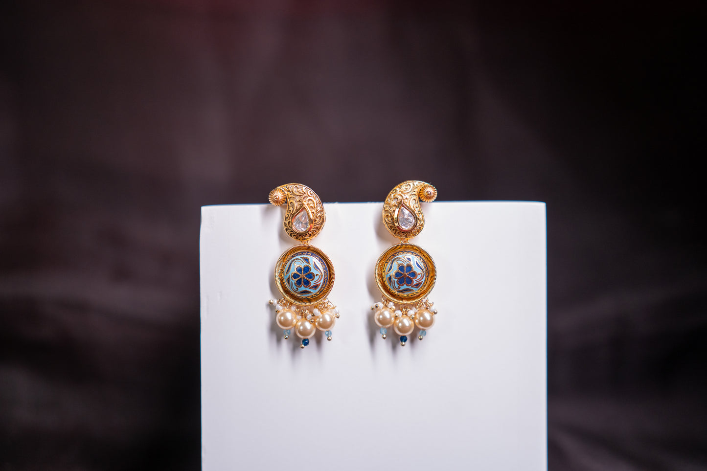 Beautiful gold finish stone polki and enamel work earrings in blue