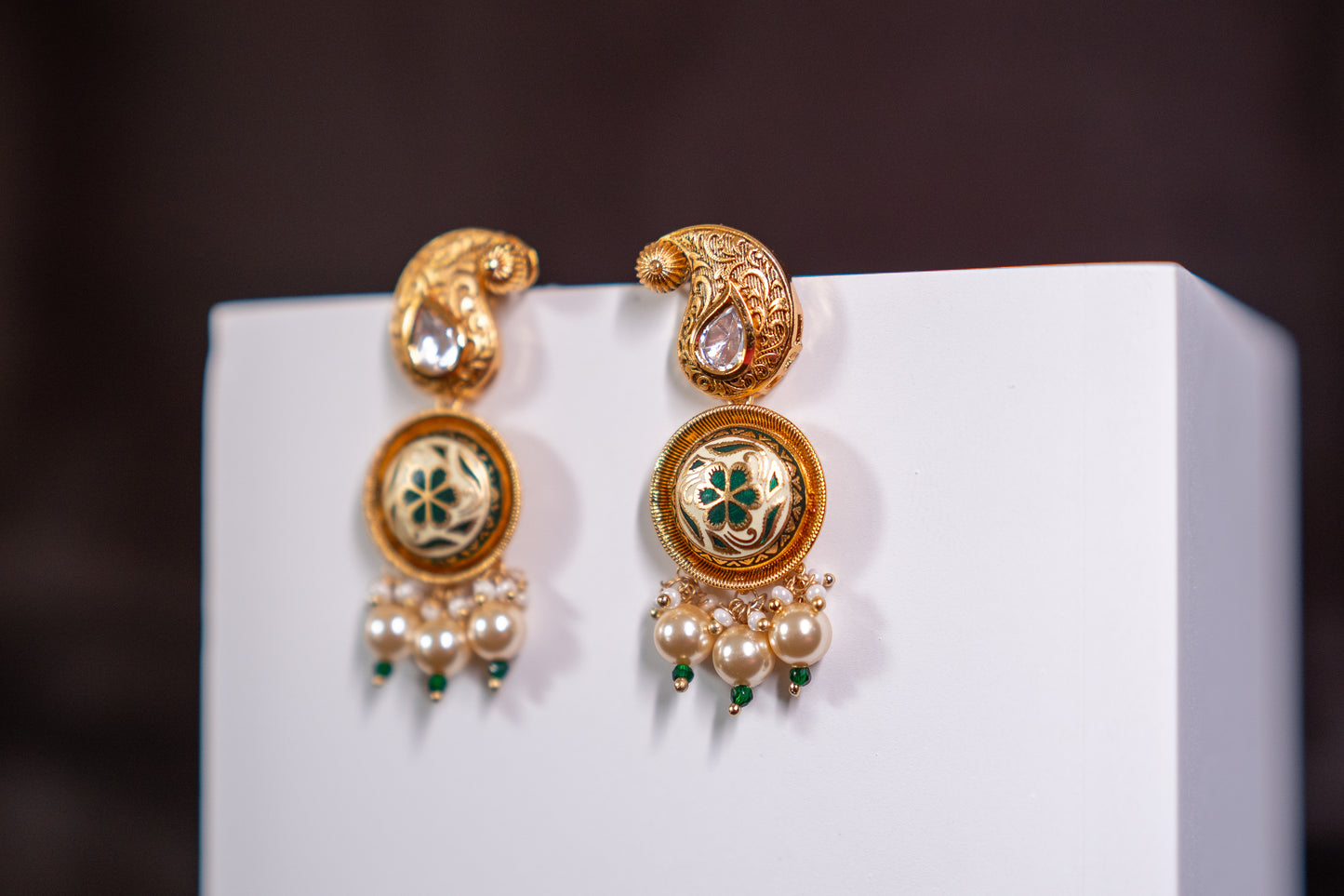 Beautiful gold finish stone polki and enamel work earrings in green