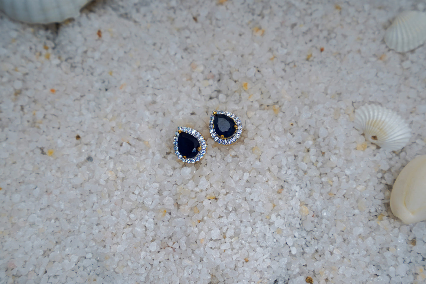 Blue Aurelia ear studs in gold finish