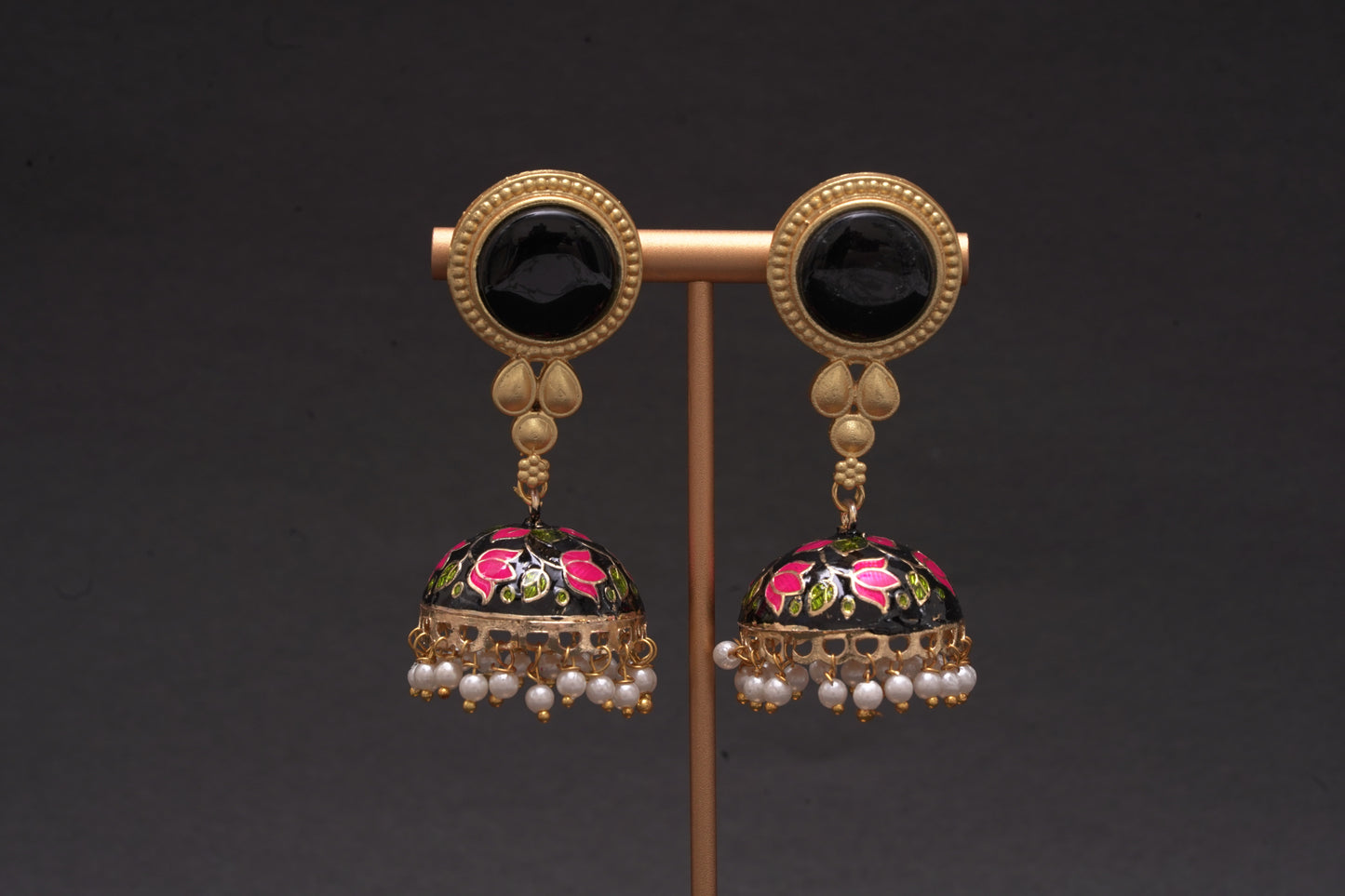 Colourful jhumkas in black and pink with enamel finish