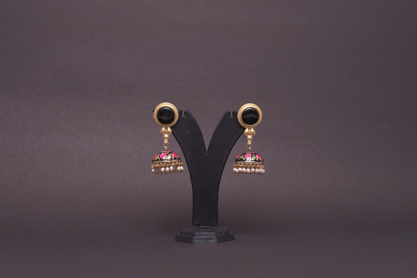 Colourful jhumkas in black and pink with enamel finish