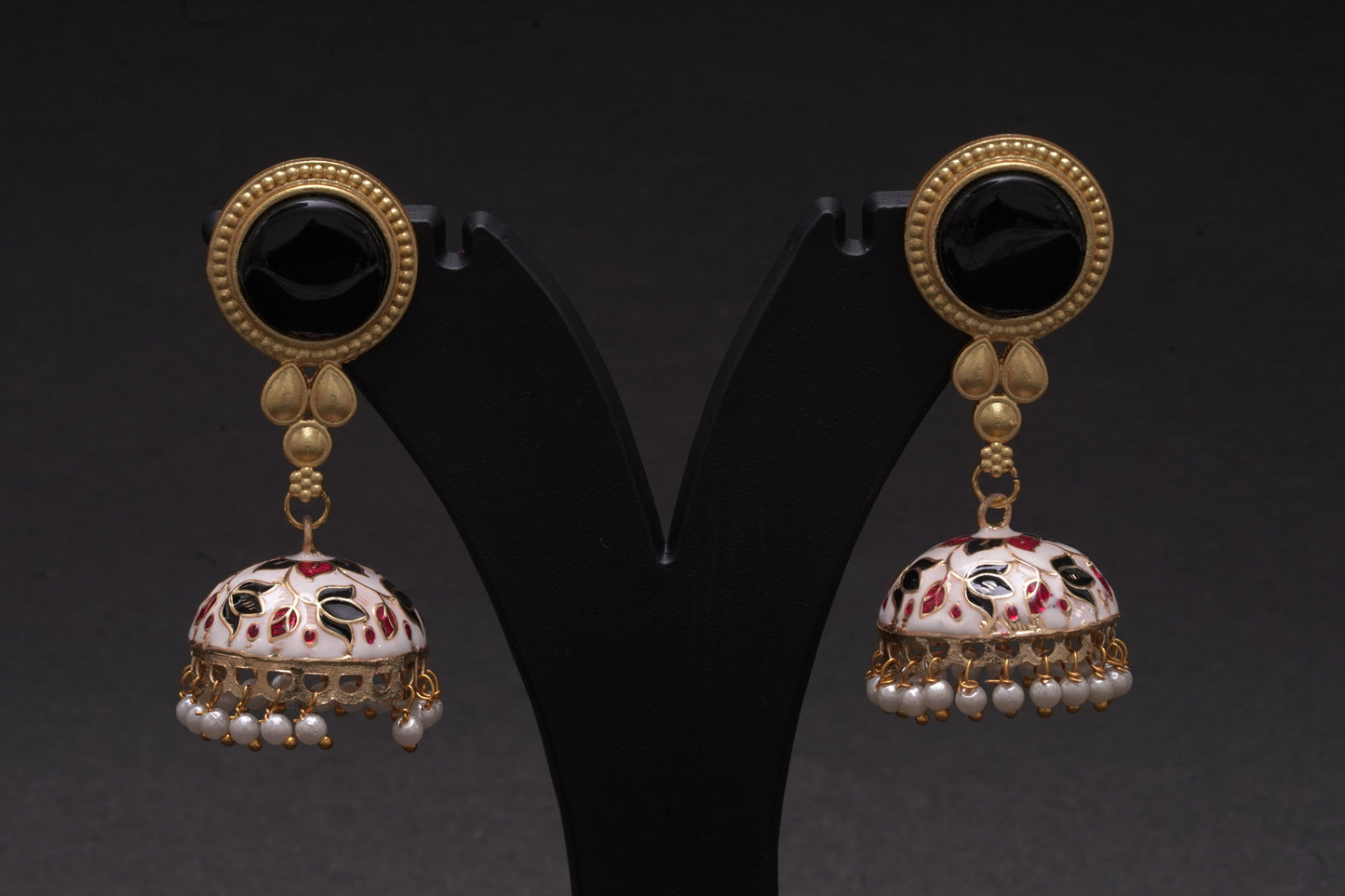 Colourful jhumkas in classic white and black with enamel finish