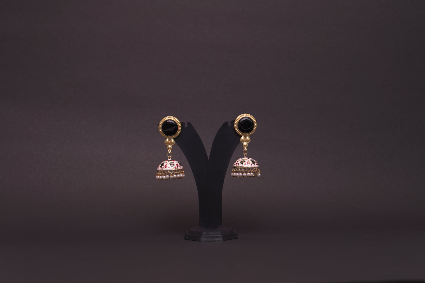Colourful jhumkas in classic white and black with enamel finish