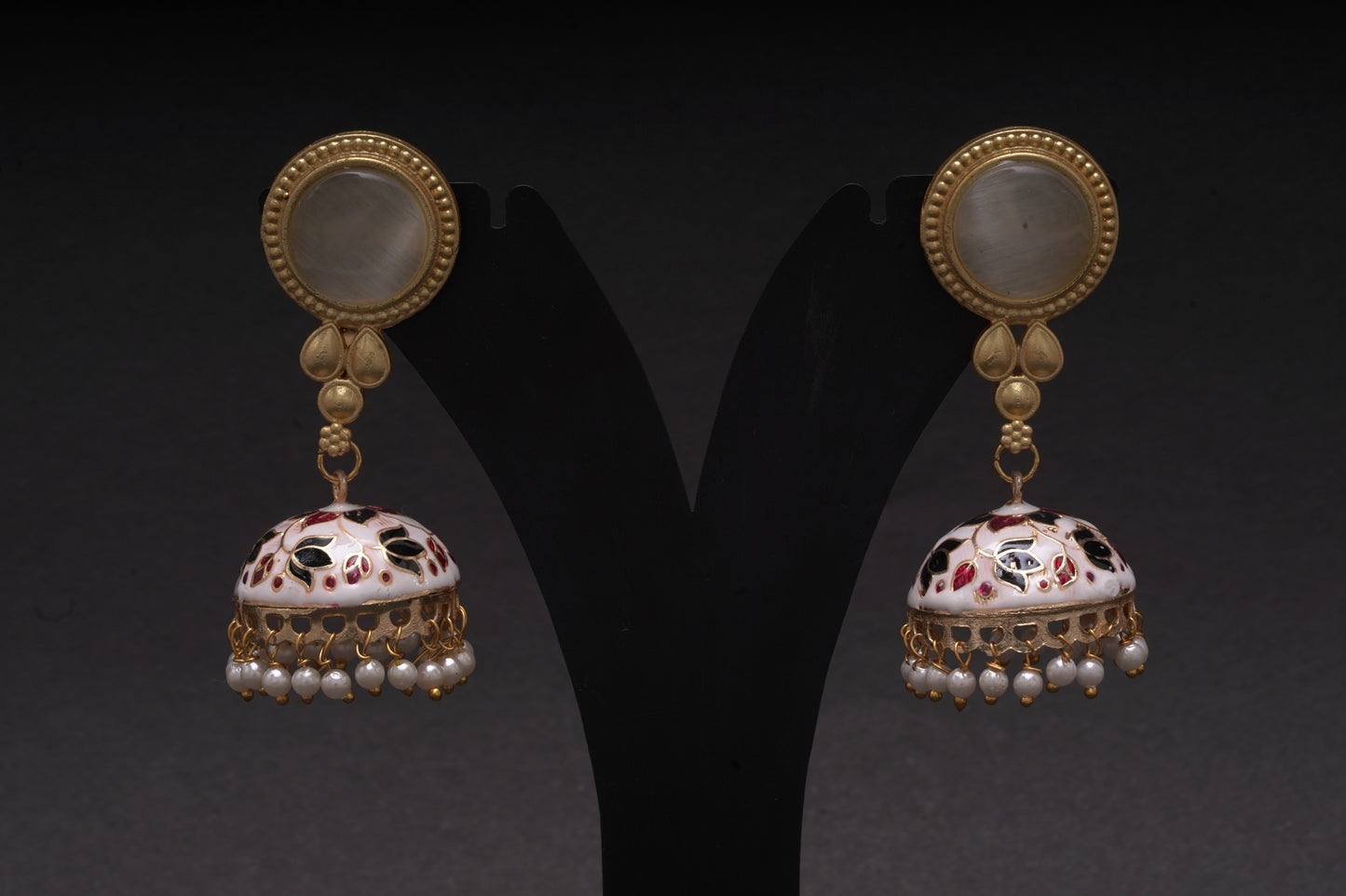 Colourful jhumkas in pristine white with enamel finish