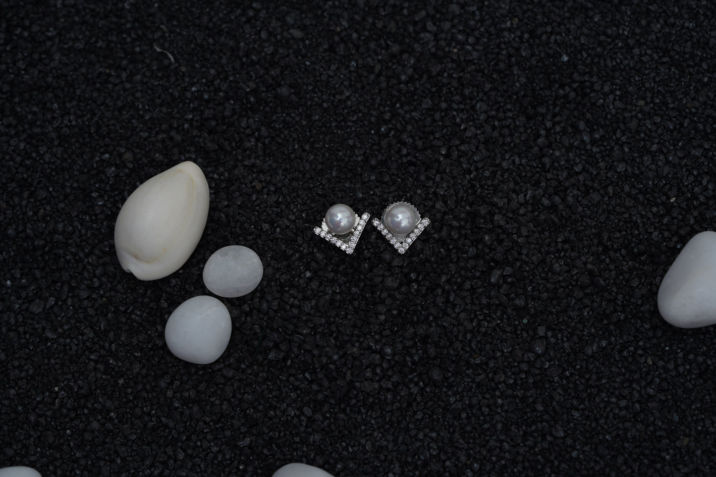 Cupid pearl ear studs in silver finish