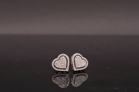 Delicate heart shaped ear studs in American diamond in white gold finish