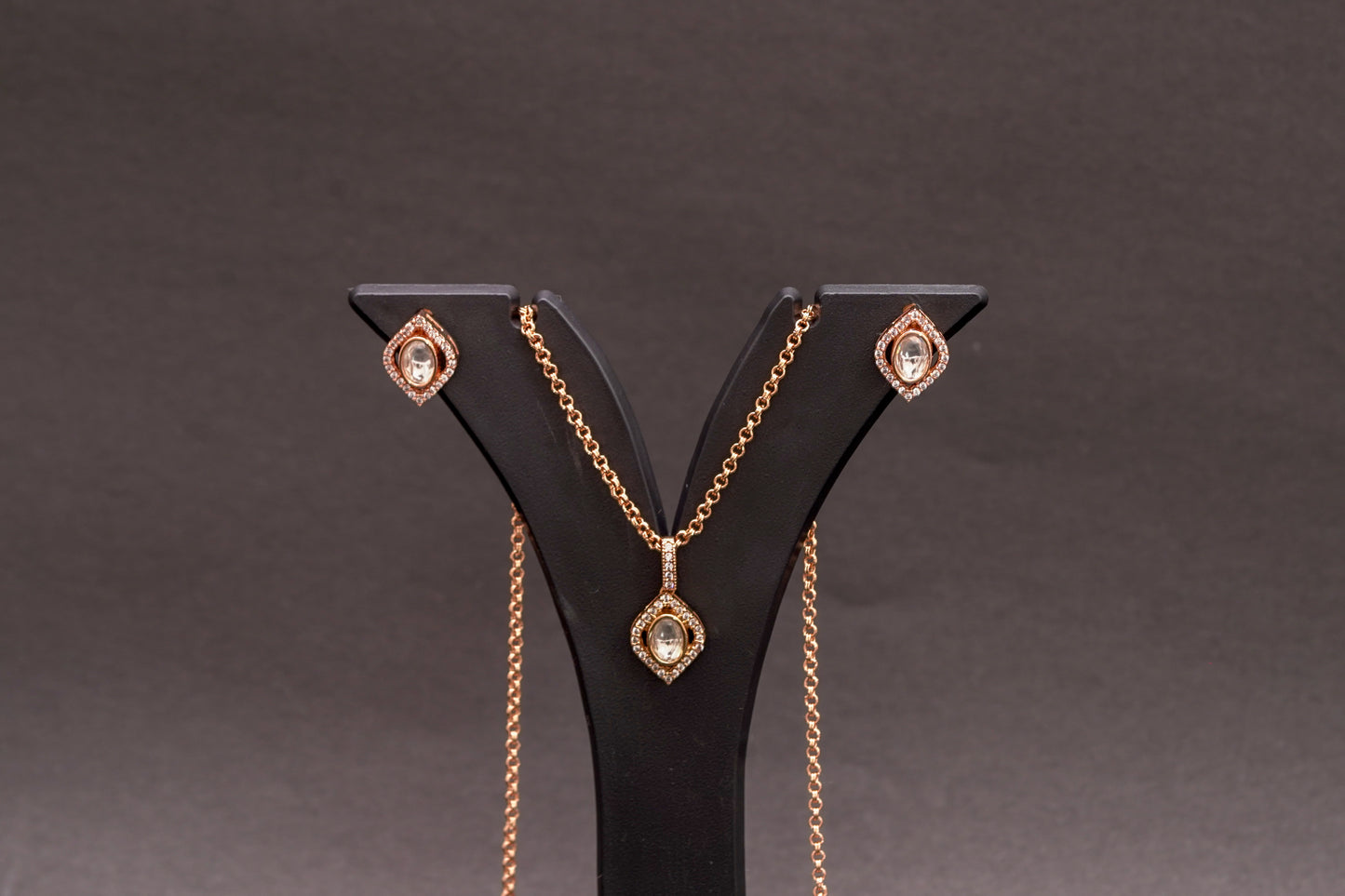 Diamond shaped polki stone pendant set in gold finish