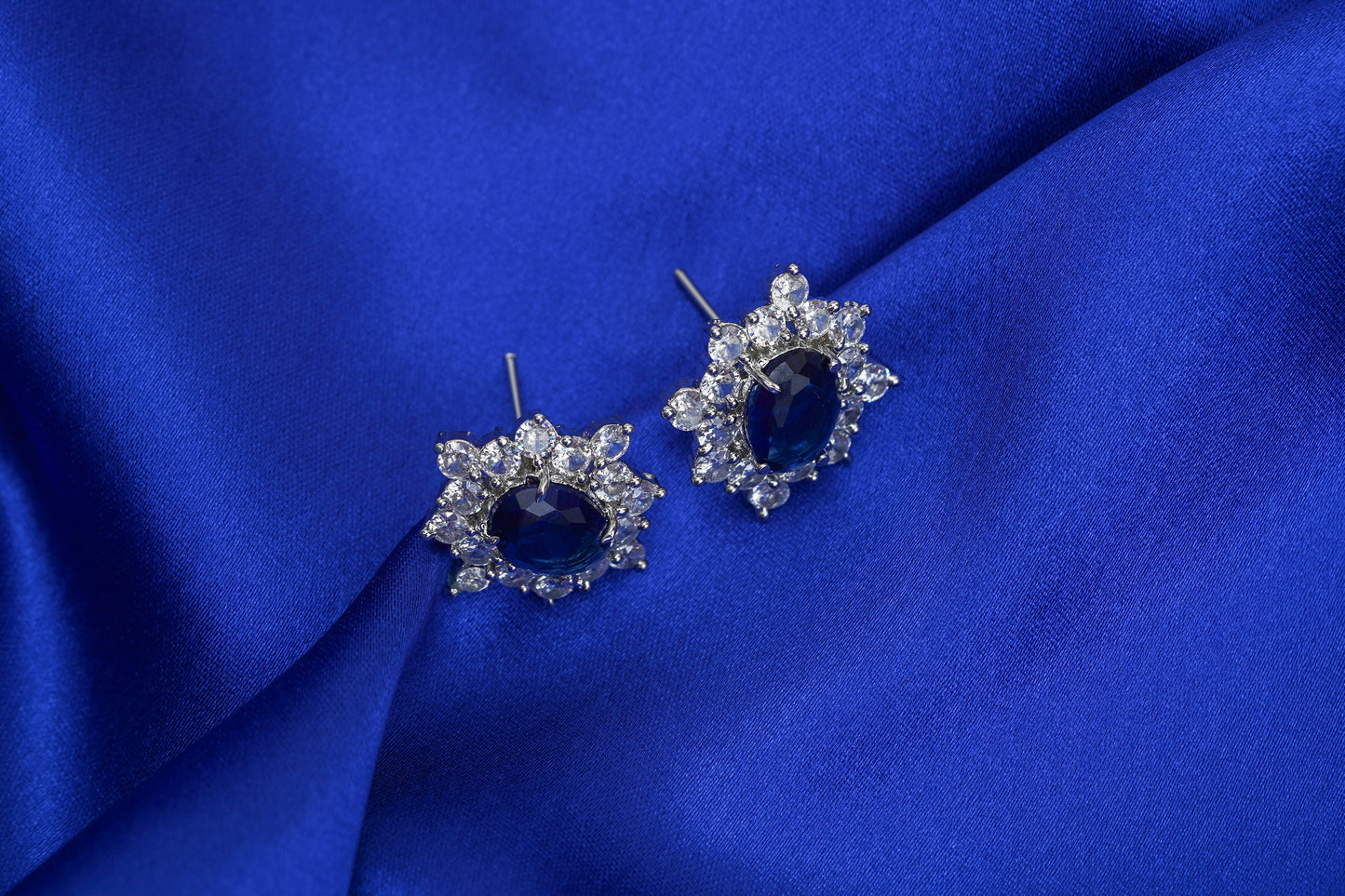 Diana blue sapphire and AD ear studs