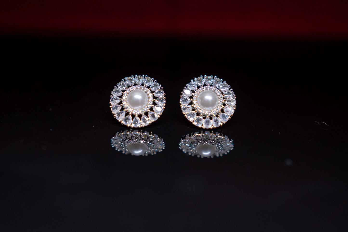 Effortlessly beautiful round ear studs with pearl and real American diamonds