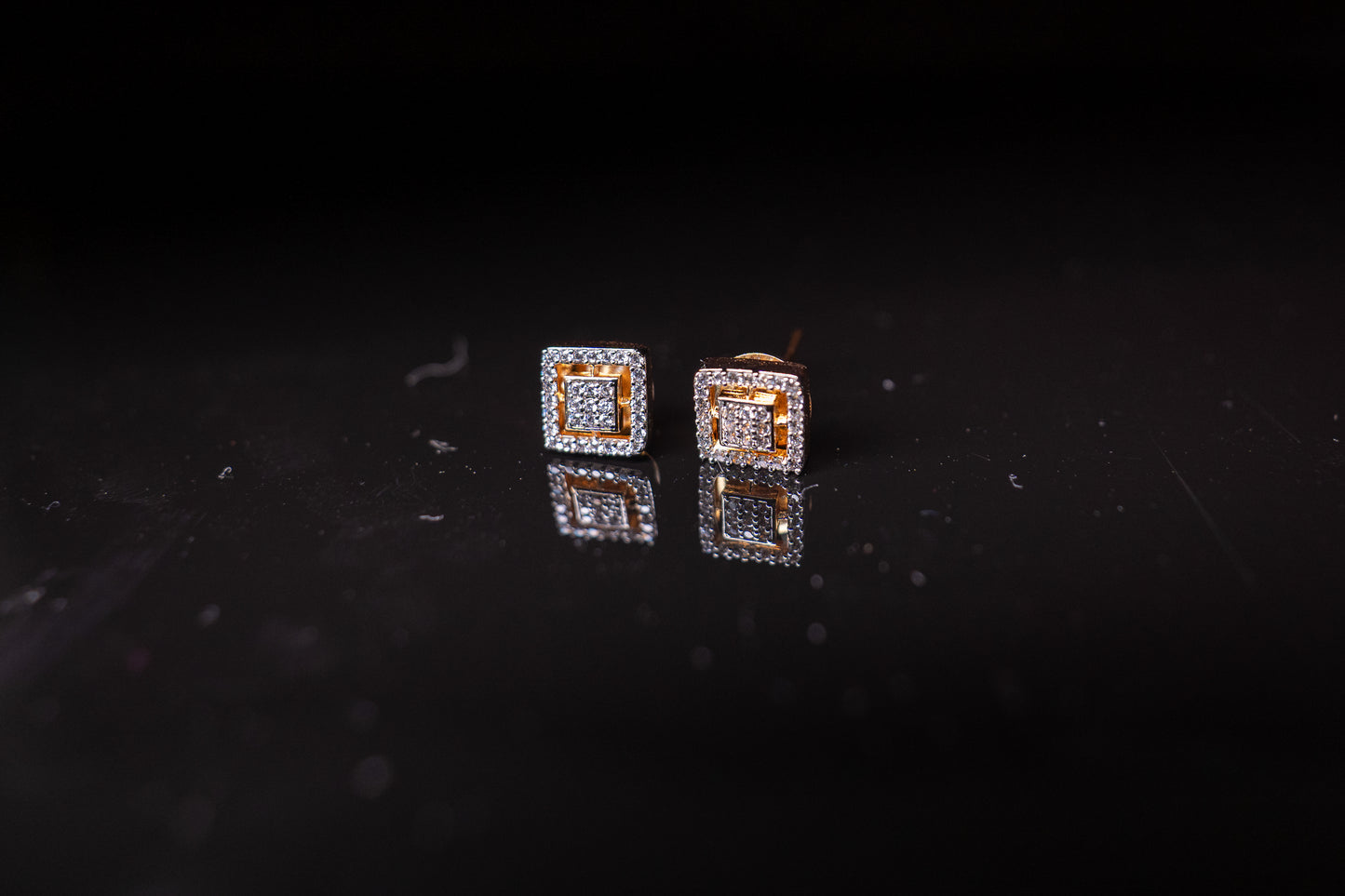 Elegant American diamond studs in a square shape in gold finish