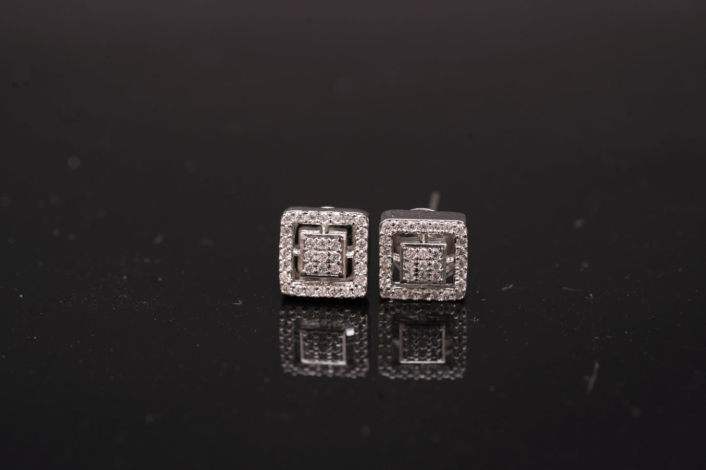 Elegant American diamond studs in a square shape in white gold finish