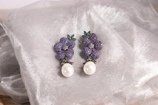 Exquisite flower shaped earrings with a pearl drop
