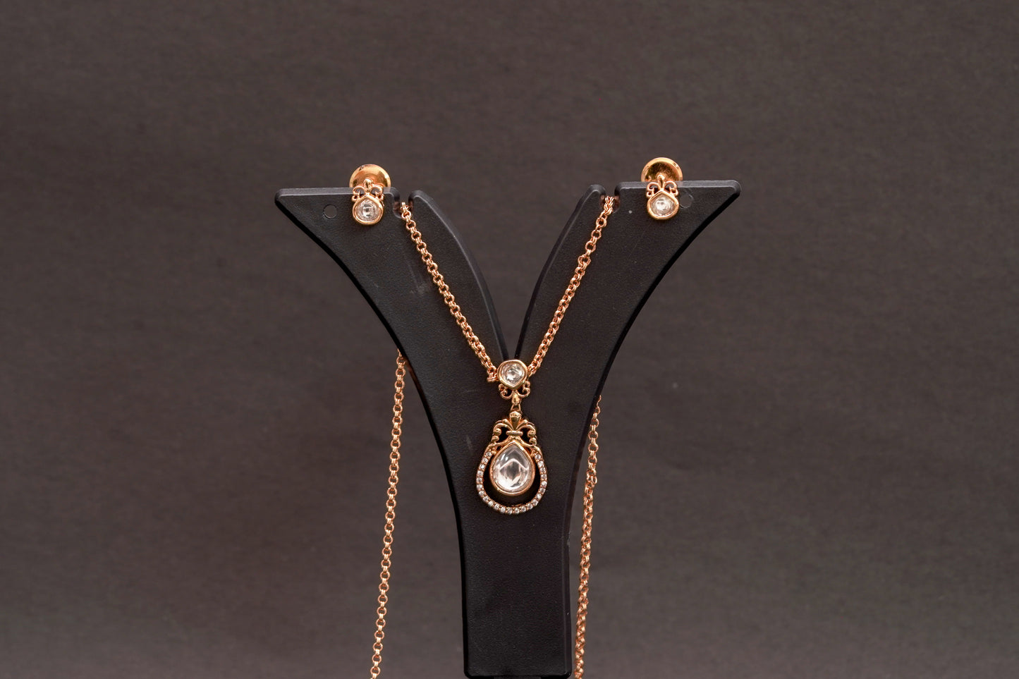 Gold finish pendant set in an adorable pineapple shape