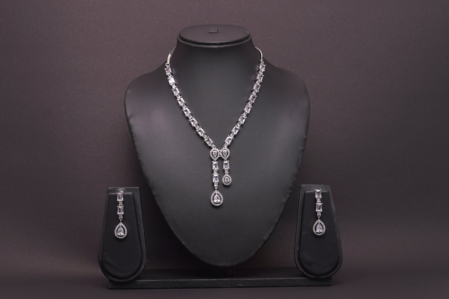 Irresistible necklace set with a double tear drop pendant in real American diamonds