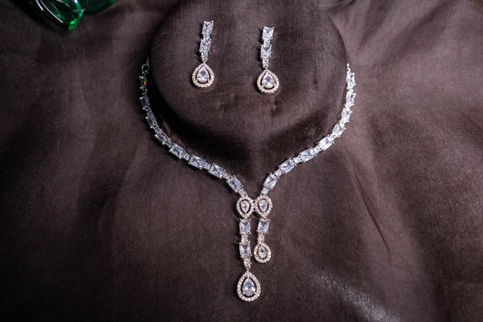 Irresistible necklace set with a double tear drop pendant in real American diamonds