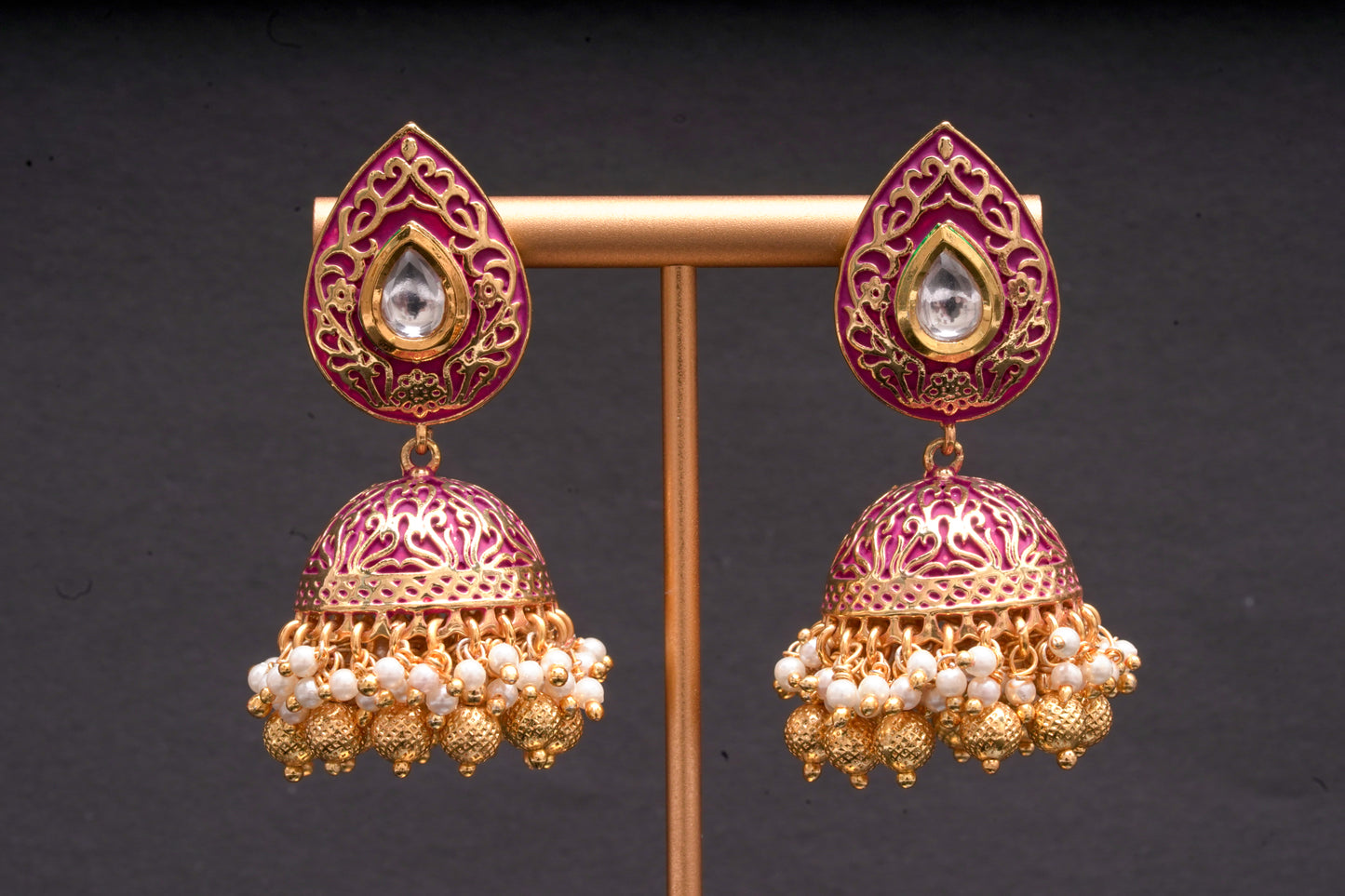 Jaipur rani pink jhumkas in gold finish