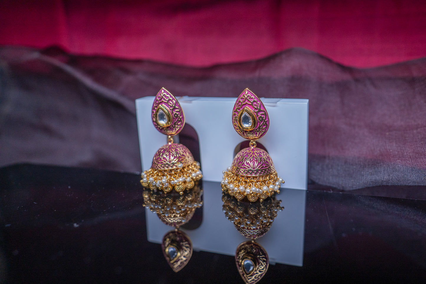 Jaipur rani pink jhumkas in gold finish