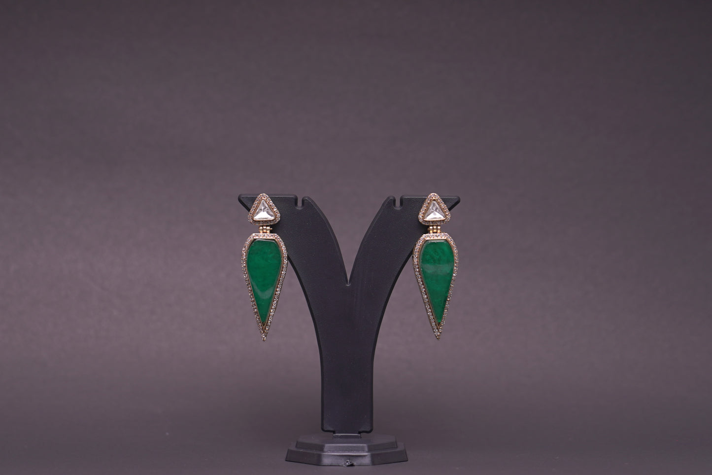 Leaf shaped danglers in green with polki and American diamonds
