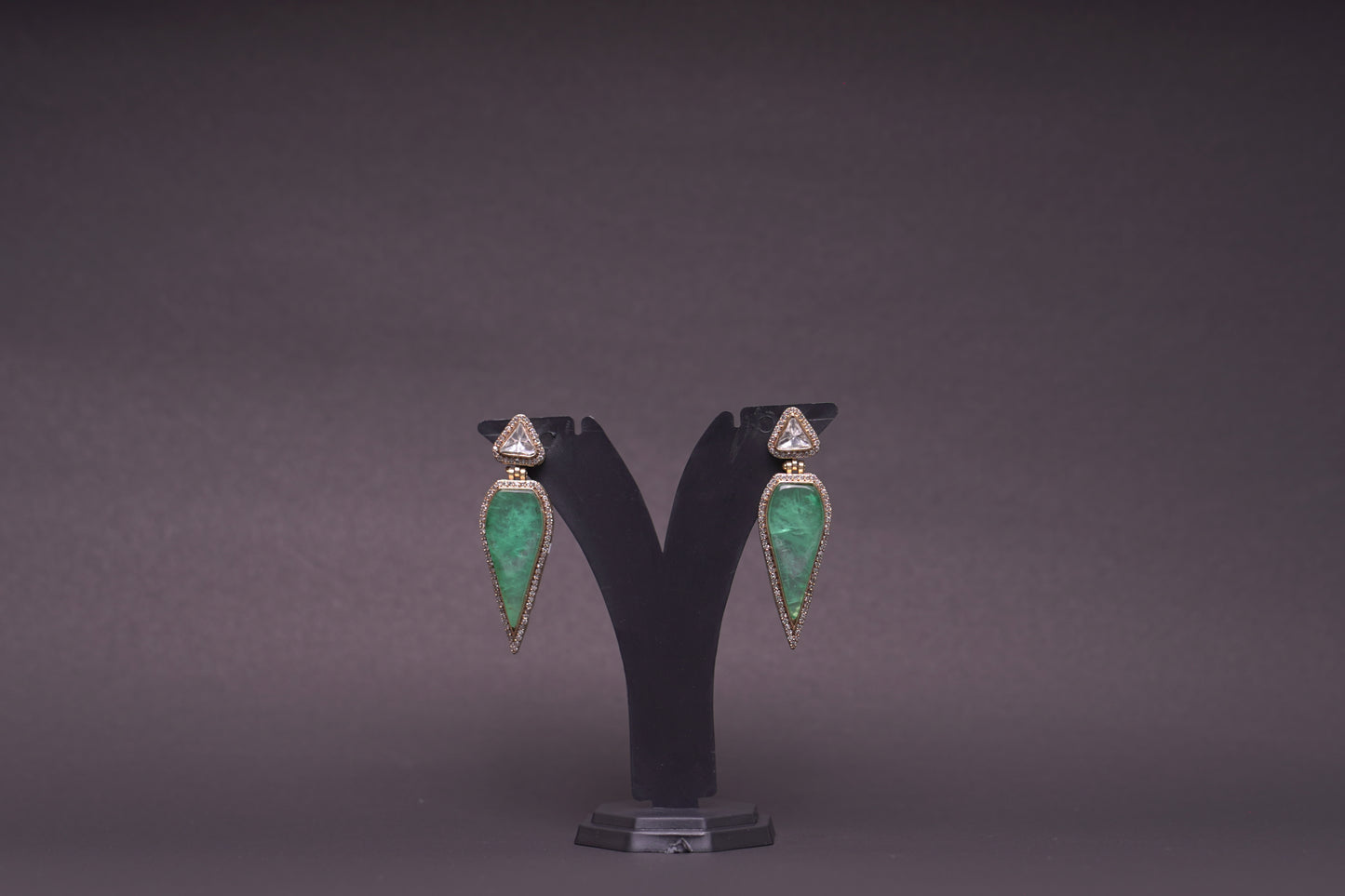 Leaf shaped danglers in verdant green with polki and American diamonds