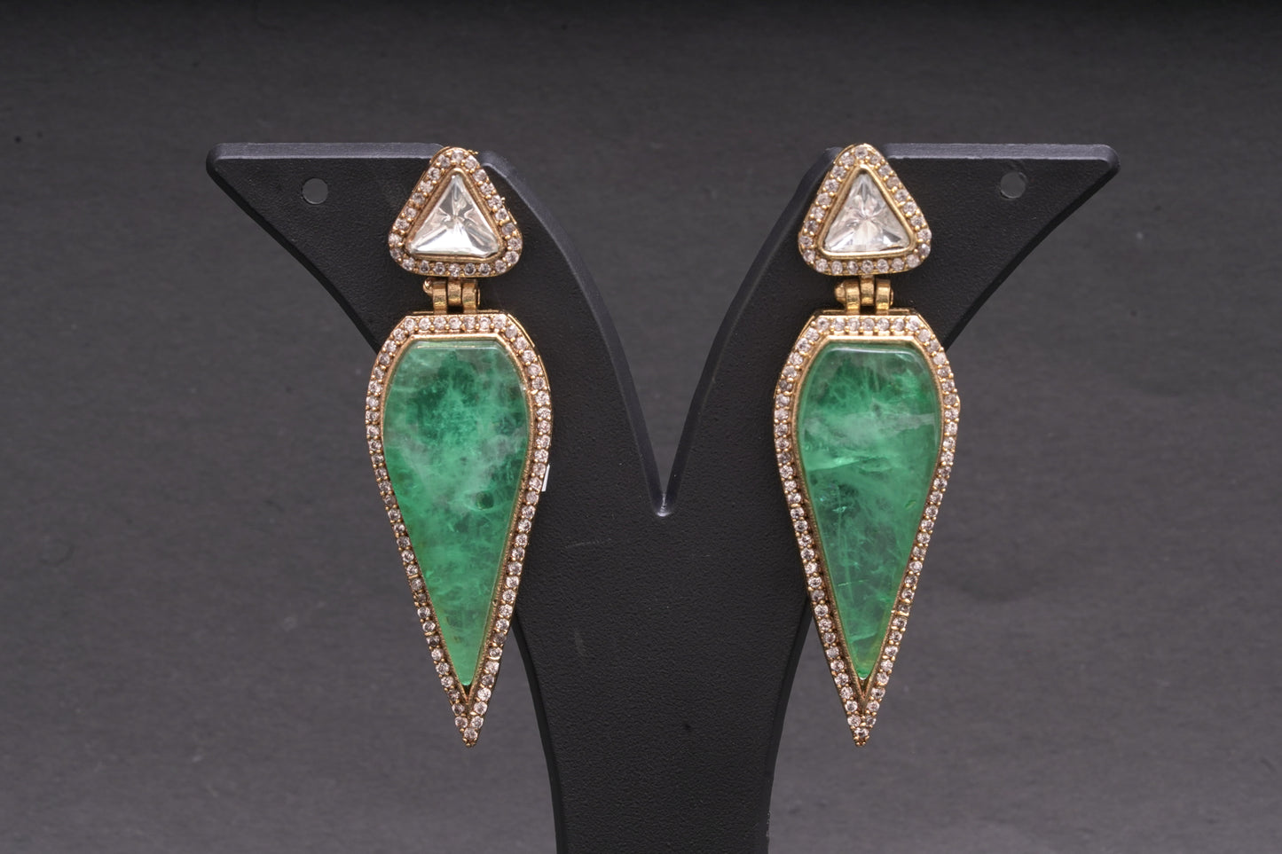 Leaf shaped danglers in verdant green with polki and American diamonds