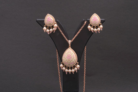 Pendant set in fine enamel work with stone polki and dainty pearls