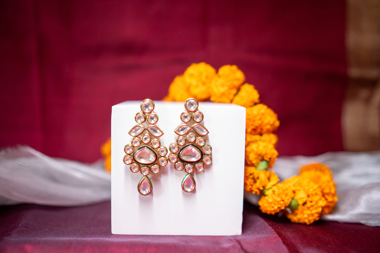 Polki chandelier earrings with meenakari work in gold finish