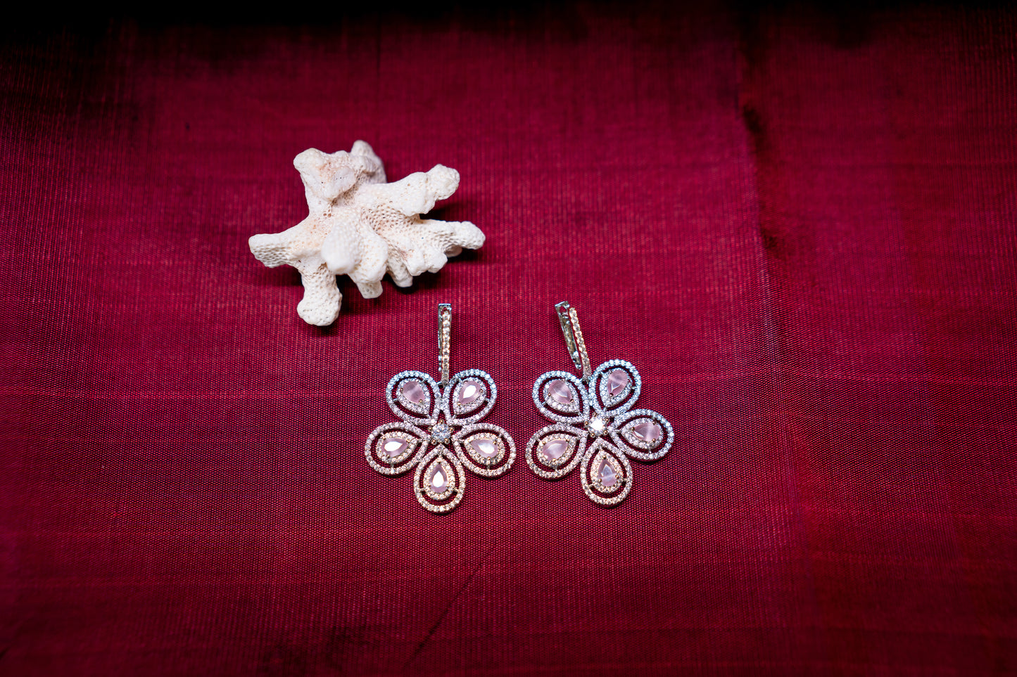 Pretty flower shaped American diamond earrings in feminine pink